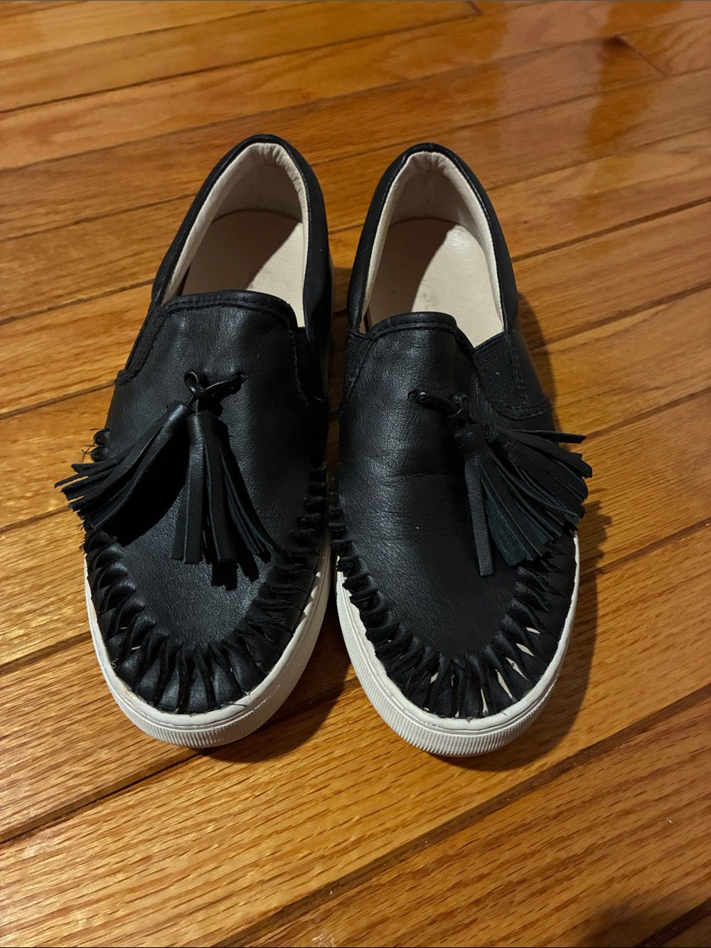 J/slides Black Tassel Slip-On Sneakers